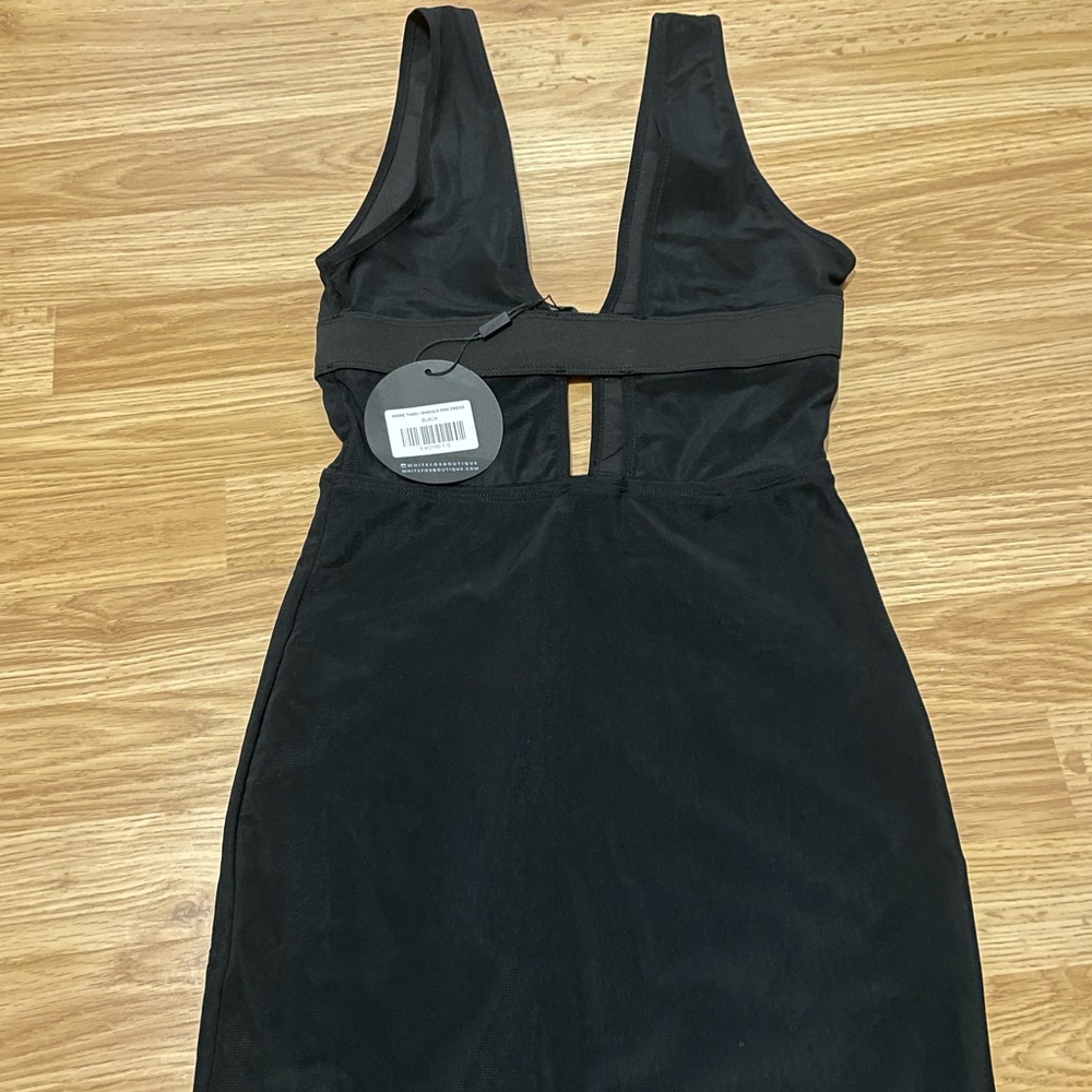 Brand new white fox black mini dress